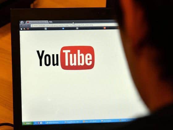 Stock photo of a person using YouTube. Photo: PA