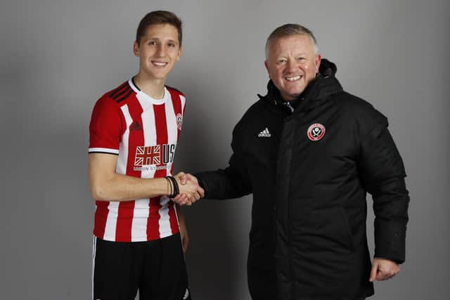 Panagiotis Retsos will be involved in Sheffield United's FA Cup tie at Reading, says manager Chris Wilder (right)