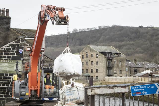 Makeshift defences spared further flooding in the Calder Valley.