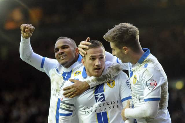Hat-trick star: Leeds United striker Ross McCormack is congratulated by Luke Murphy and Rodolph Austin after scoring his hat-trick in February 2014. Picture: Simon Hulme