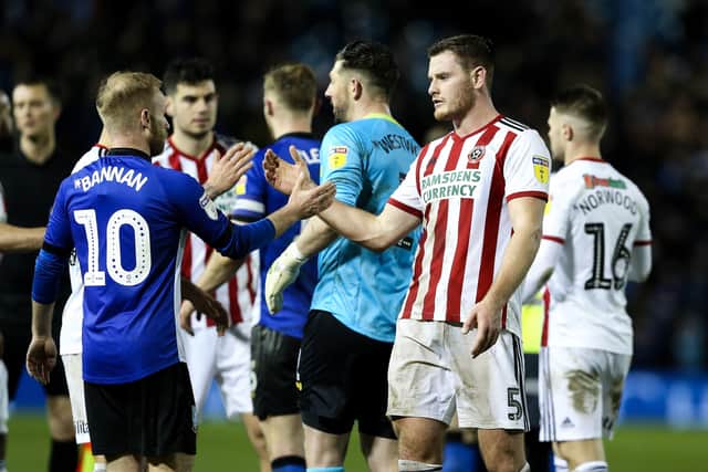 Barry Bannan of Sheffield Wednesday and Jack O'Connell of Sheffield United shake hands after the last Steel City derby in March 2019. Picture date: 4th March 2019. Picture: James Wilson/Sportimage