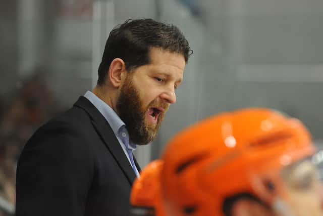 Aaron Fox, behind the Steelers' bench in Cardiff on Friday night. Picture: Dave Williams/EIHL.