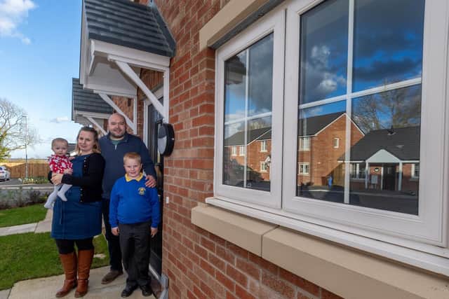 Pictured Ellen, 27, Brendan, 34, Dyson and their children Riley, 7, and Phoebe, aged 9 months, who have just bought their first home together through a shared ownership and are in the process of moving into the new home on Duke's Close, just off Hutton Road Hutton Cranswick, East Yorkshire. Pic: James Hardisty