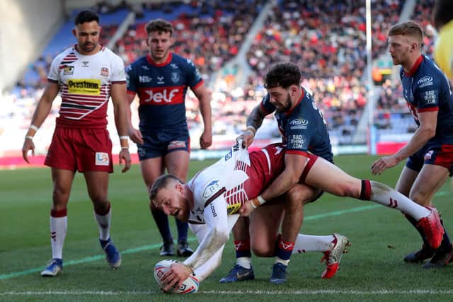 Wigan warriors Jackson Hastings scores during the Betfred Super League match at DW Stadium, Wigan. (Richard Sellers/PA Wire)