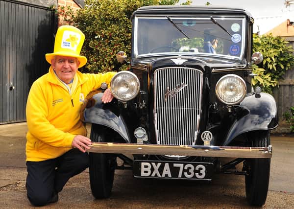 Pictured with his 1935 Austin 10 Litchfield which he is going to drive around the coast of England for Marie Curie, 73 year old Harrogate man Mervyn Hoyle who had dedicated 35 years of his life to volunteering for Marie Curie.
Picture Gerard Binks