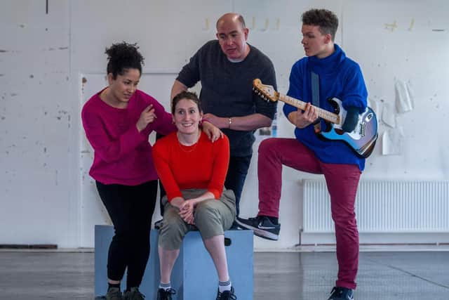 Cast members Danielle Henry, Jonathan Dryden Taylor and Max Runham with Tess Seddon in rehearsals for Say Yes To Tess in Leeds