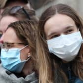 Spectators wearing masks to protect against coronavirus outside the Commonwealth Service at Westminster Abbey, London on Commonwealth Day.
Photo credit: Jonathan Brady/PA