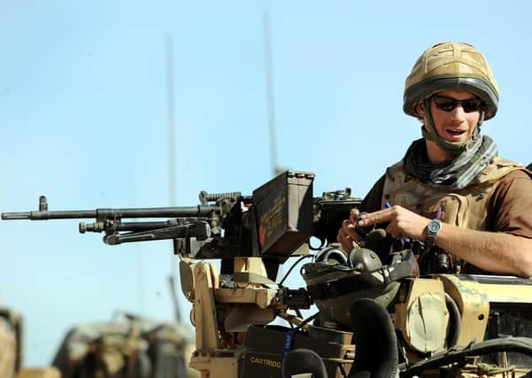 File photo dated 28/2/2008 of Prince Harry sits in his position on a Spartan armoured vehicle in the Helmand province, Southern Afghanistan. The Duke of Sussex fought in Afghanistan on the frontline, but is now severing his official ties to the military as he quits royal life completely.