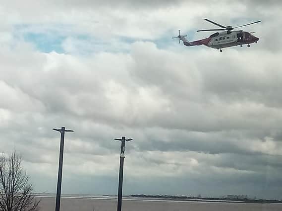 The search and rescue helicopter hovering over the Deep on Tuesday afternoon