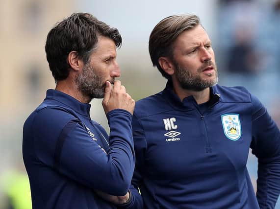 Huddersfield Town assistant manager Nicky Cowley (right), pictured with Terriers chief and his brother Danny (left).