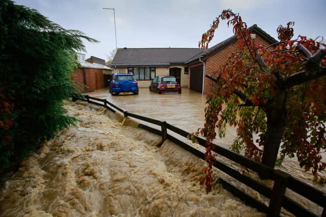 This was the scene in Whiston when flood waters began to rise last November.