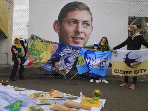 Cardiff supporters gather to pay tribute to Argentinian football player Emiliano Sala prior the French League One match between Nantes against Bordeaux at La Beaujoire stadium. Credit: AP Photo/Michel Euler