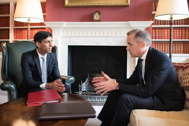 Chancellor Rishi Sunak in conversation with Mark Carney ahead of his speech.