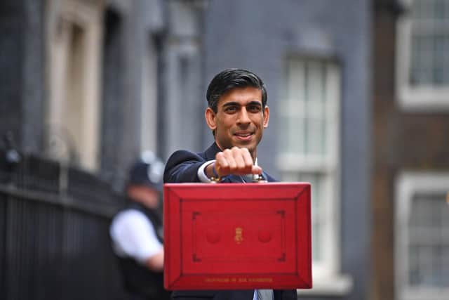 Chancellor Rishi Sunak leaves 11 Downing Street to deliver his Budget.