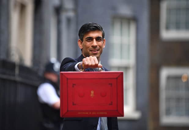 Chancellor Rishi Sunak outside 11 Downing Street, London, before heading to the House of Commons to deliver his Budget. Picture: Jones/PA Wire