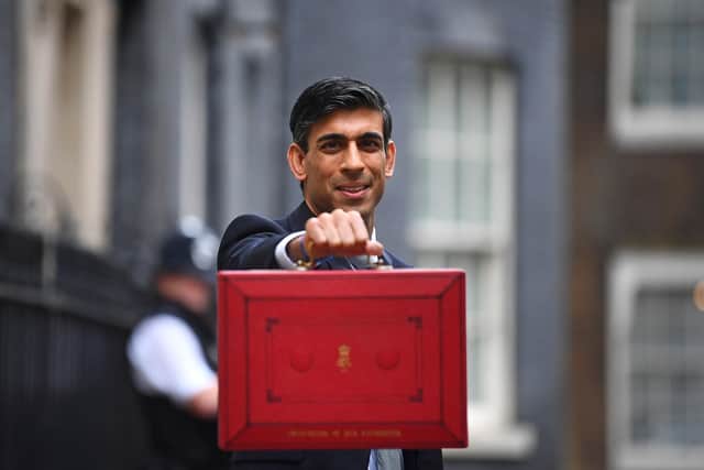 Chancellor Rishi Sunak outside 11 Downing Street, London, before heading to the House of Commons to deliver his Budget.