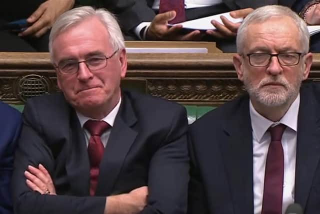 Labour leader Jeremy Corbyn and John McDonnell, the Shadow Chancellor, during the Budget.