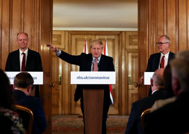 NOW HEAR THIS: Prime Minister Boris Johnson, Chief Medical Officer for England, Chris Whitty and Government Chief Scientific Adviser, Sir Patrick Vallancea their news conference on Thursday. Picture: Simon Dawson-WPA/Getty Images