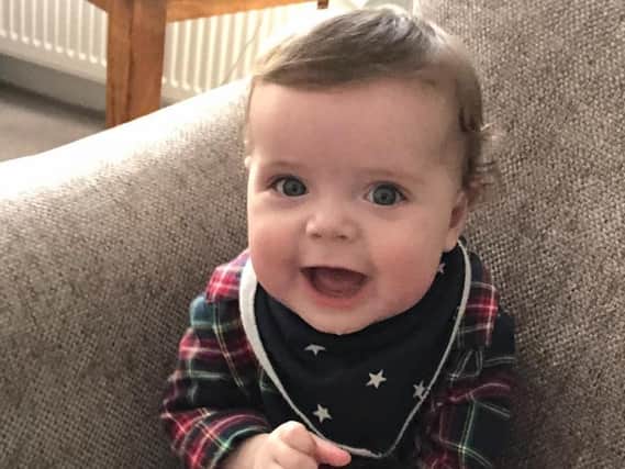 Ralph Gibbs, who will be nine months old this week, is now a thriving and happy boy after undergoing treatment for a rare benign tumour of blood vessels.