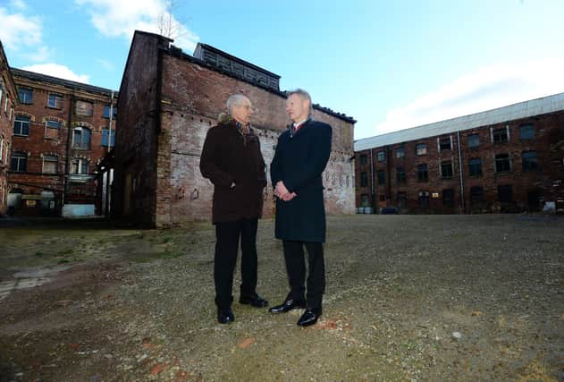 Wakefield Council Leader Peter Box and developer Paul Kempe on site at Rutland Mills in Wakefield. The sale of the mill signals the final phase of Wakefield's Waterfront regeneration masterplan. Picture Scott Merrylees