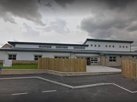 A 12-year-old boy was shot at the Northfield Hall Community Centre in Huddersfield. Credit: Google Maps.