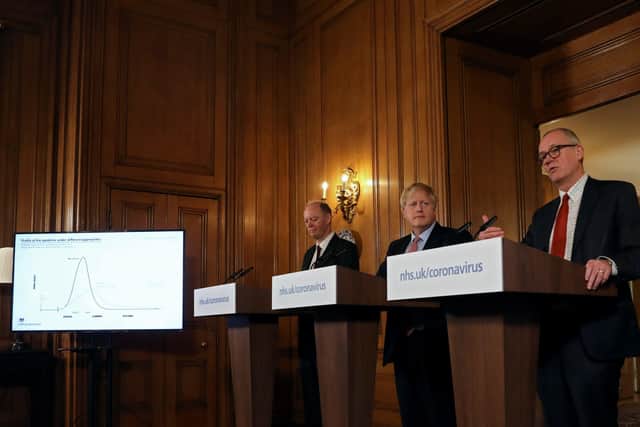 British Prime Minister Boris Johnson, Chief Medical Officer for England, Chris Whitty and Government Chief Scientific Adviser, Sir Patrick Vallance hold a news conference addressing the government's response to the coronavirus outbreak on March 12. Picture: Getty