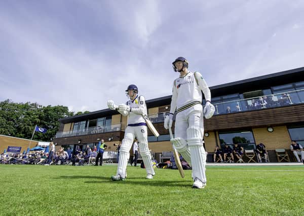 Sunnier days for Yorkshire, as  James Logan and James Paterson come out to bat at York cricket ground's Clifton Park against Warwickshire last summer.