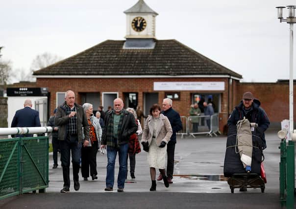 Racegoers arrive at Market Rasen Racecourse on Sunday. (Picture: Nigel French/PA Wire)