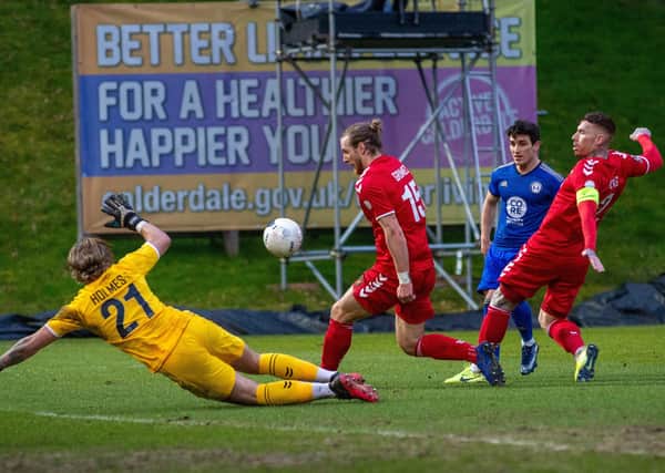 Jack Redshaw's shot is saved by Jordan Holmes. during the Saturday's National League clash between FC Halifax Town and Ebbsfleet United. Picture: Bruce Rollinson