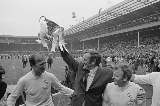 GREAT DAYS: Leeds United manager Don Revie lifts the FA Cup trophy in 1972 with Jack Charlton, Billy Bremner and Paul Reaney. Picture: Getty Images.