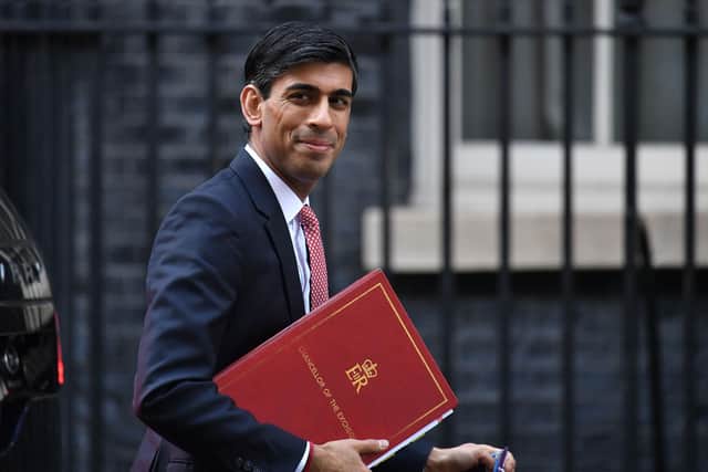 Chabclelor Rishi Sunak arrives in Downing Street on March 17.