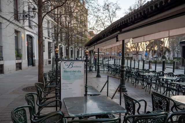 A deserted terrace bar close to Madrid's Royal Palace, which would normally be bustling on an evening this time of year. Photo credit: James Dacey