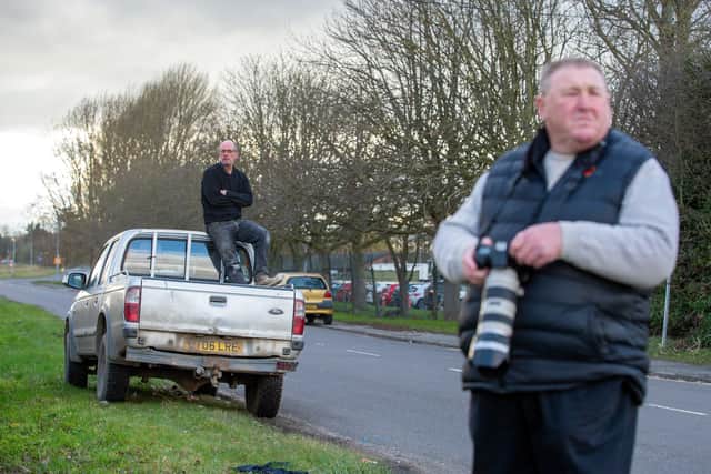 Regular racegoer Phill Andrews, a keen racing photographer, tries to get a vantage point for Wetherby's 'behind closed doors' meeting.