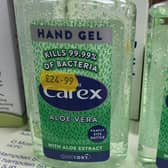 24.99 bottles of Carex hand gel on sale at Hampden Square Pharmacy in north London. Photo: @JohnStealer/PA Wire