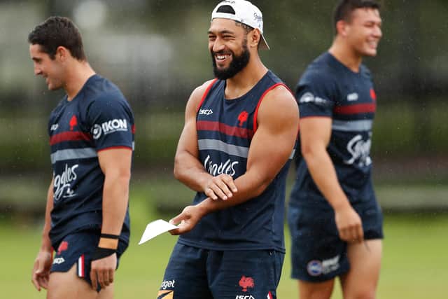 Sydney Roosters' Isaac Liu shares a joke during a training session at Kippax Lake earlier this week. Picture: Brendon Thorne/Getty Images