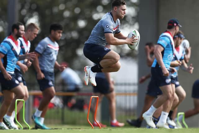 GEARING UP: Ryan Hall warms up during a Sydney Roosters training session at Kippax Lake Oval on March last year. Picture: Matt King/Getty Images