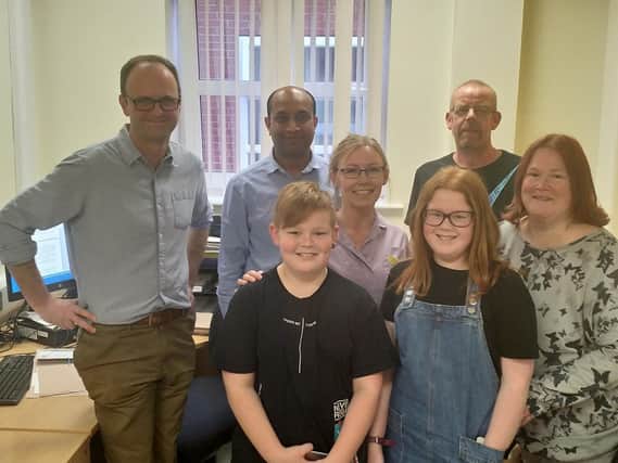 Connor and Keira Pickering (front with parents right) were some of the first patients treated by Specialist Nurse Claire Tucson (behind) and Dr Dominic Smith and Dr Deepak Chandrajay (left)