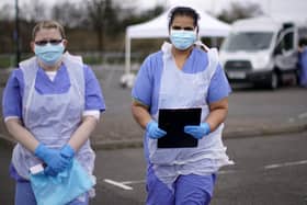 NHS nurses wait for the next patient at a drive through Coronavirus testing site in the Midlands. (Getty images).