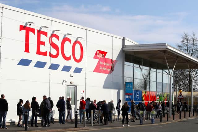 Long queues formed outside this Tesco supermarket at the weekend.