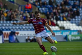 SUDDEN IMPACT: Huddersfield Giants' Aidan Sezer kicks the conversion from the first try.   Picture: Tony Johnson.