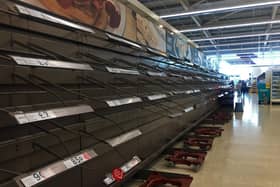 Supermarket shelves have been left empty through panic buying.
