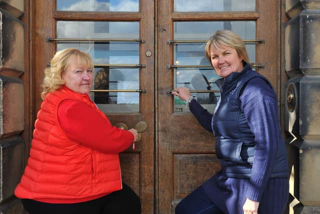 Trust founder Dame Julie Kenny and chief executive Sarah McLeod lock the doors to the house