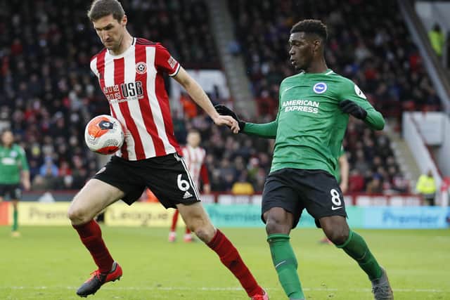 Chris Basham of Sheffield United and Yves Bissouma of Brighton during the Premier League match at Bramall Lane, (Picture: Simon Bellis/Sportimage)