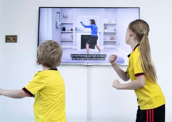 Children take part in PE lessons devised by The Body Coach Joe Wicks.