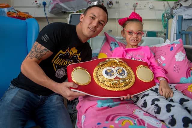 Ruby pictured with Josh Warrington in 2018, after undergoing major open heart surgery at LGI