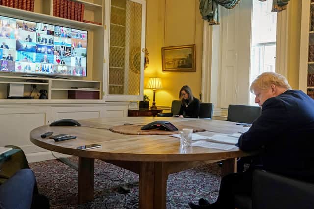 Downing Street handout picture of Prime Minister Boris Johnson in the study of 10 Downing Street on a video conference call to other G20 leaders during the coronavirus pandemic.