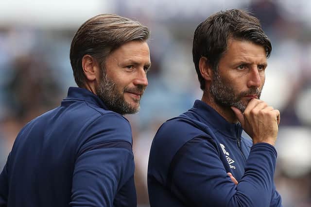 Huddersfield Town manager Danny Cowley (left) with brother and assistant manager Nicky (right).