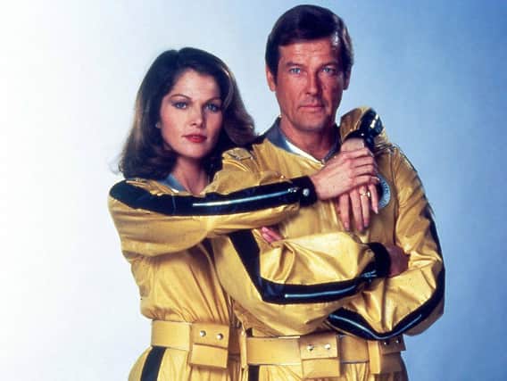 A James Bond memorabilia collector had rare guns from the films stolen from his house. Lois Chiles and Roger Moore in Moonraker (James Bond).