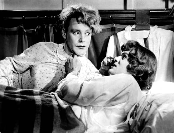 Tony Curtis, left, and Jack Lemmon dress in drag for a scene from Billy Wilder''s film "Some Like It Hot" in 1959. (Photo by Getty Images)
