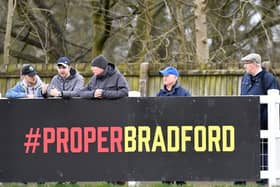 Fans behind a #Proper Bradford sign during the Vanarama National League North match at Horsfall Stadium, Bradford, earlier this month Credit: Dave Howarth/PA Wire